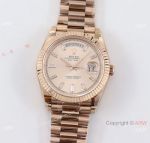 Swiss Copy Rolex Day-Date 40mm ref,228235 watch on Rose Gold Baguette Markers